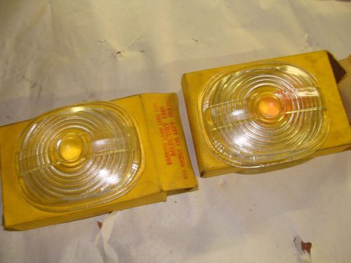 A pair of 1949 mercury parking  light lenses nors glass