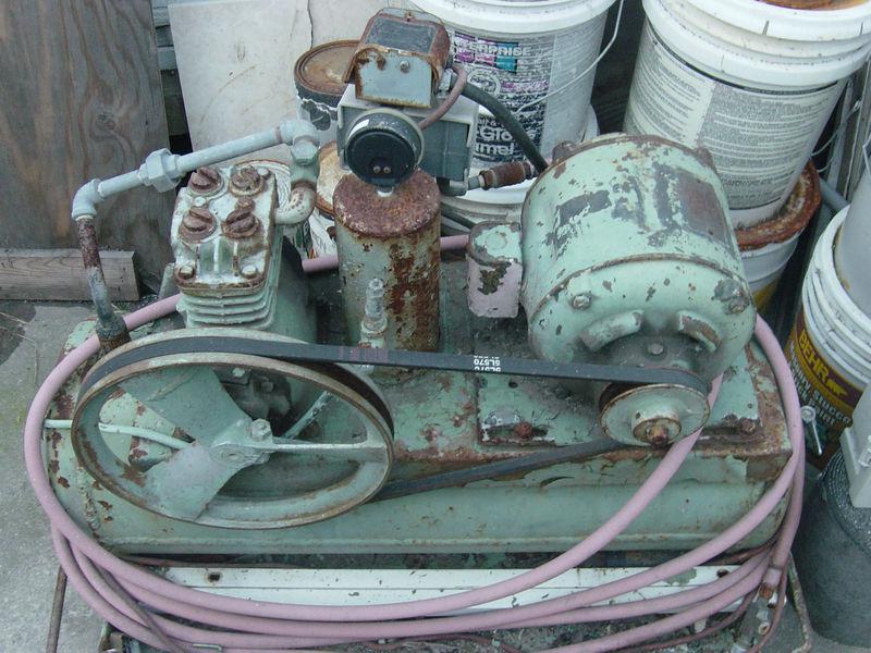 Antique flat belt air compressor