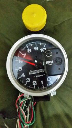 New auto meter 233905. autogage monster tachometer  with shift-lite .