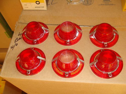 A full set of nos 1962 chevy impala tail light &amp; backup lenses with ornaments