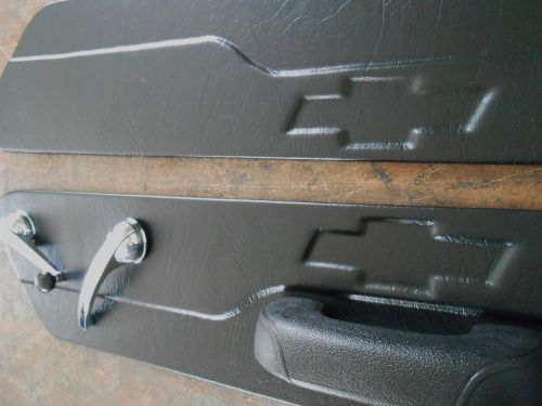 Door panel inserts custom 55/59 chevy truck black vinyl with a recessed bowtie