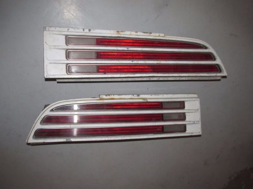 1974-78 pontiac trans am tail lights housings and lens good condition pair white