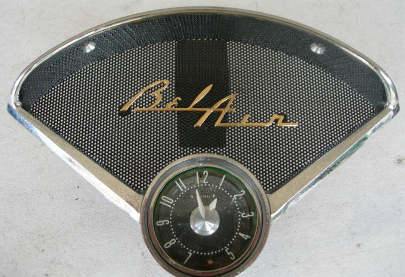 1955 1956  chevy  dash speaker bezel and clock assembly with belair nos emblem 