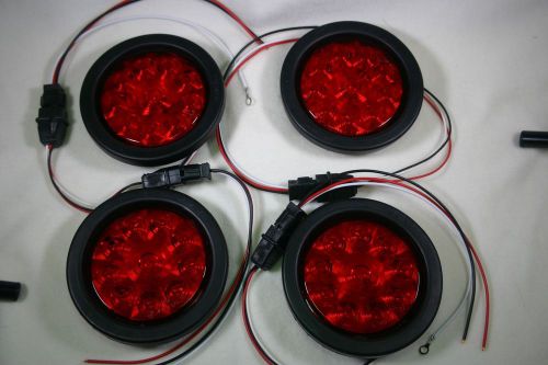 Four 12v.- 4 inch red tail lights with grommets