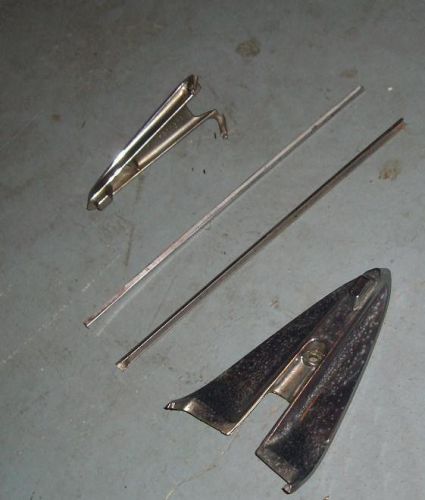 1968-1969 cadillac eldorado tail light trim  spear shaped escutcheon base bezel