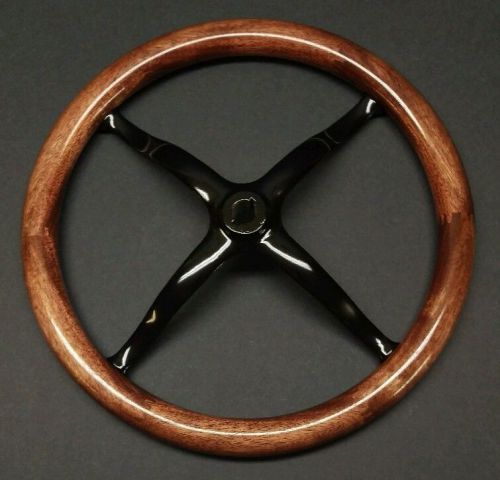 15&#034; mahogany model t steering wheel rim on a cast iron spider.